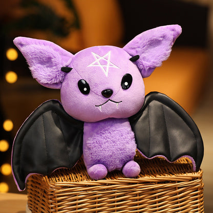 Purple devil bat plush doll in a basket