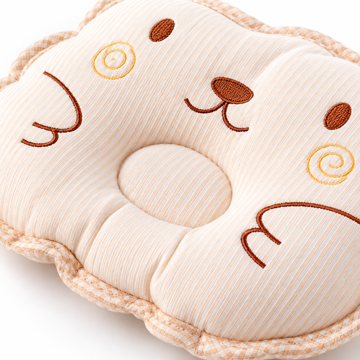 Newborn Comfort Pillow — fabric and embroidery detail